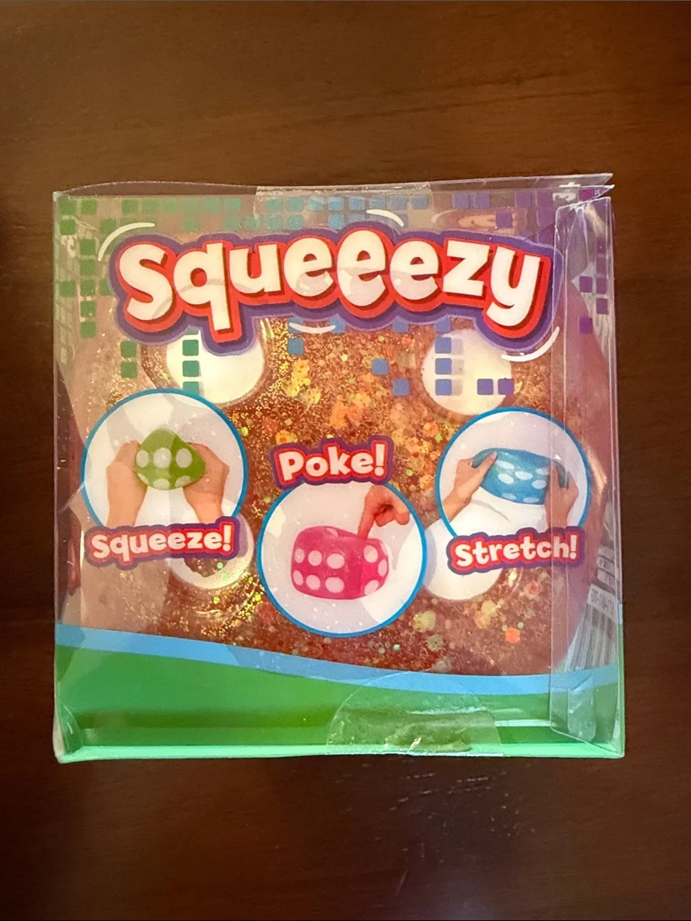 NIB Pink Squeeezy Dice squishy!